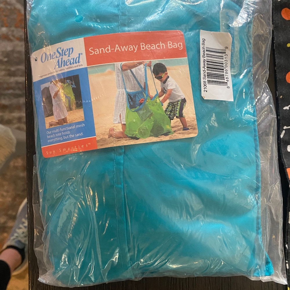 Sand away beach bag. New and unused and in original packaging